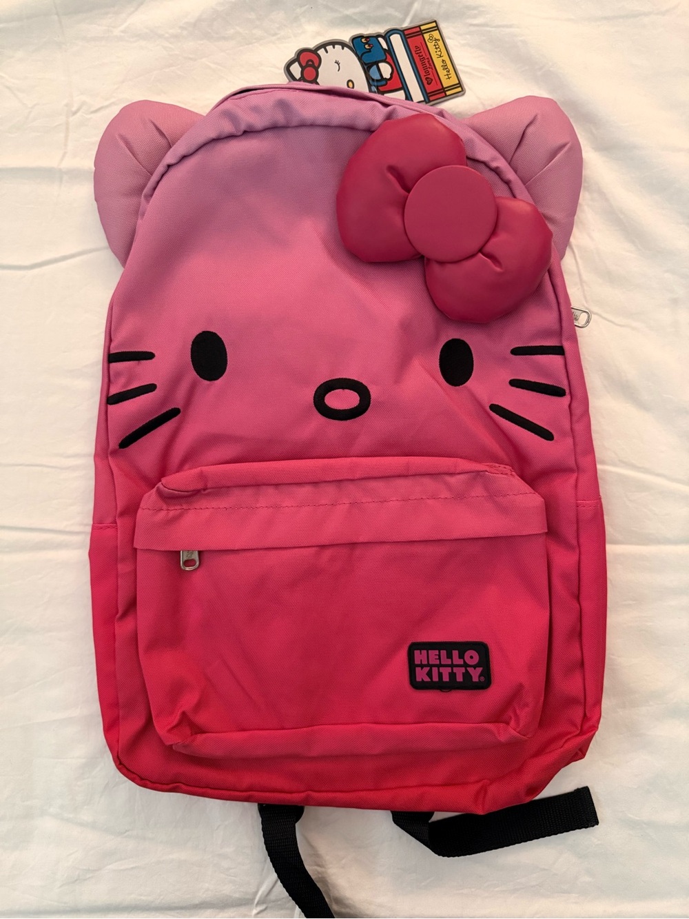 Hello Kitty Adult Backpack with leather Bow. Gradient from light to dark pink.